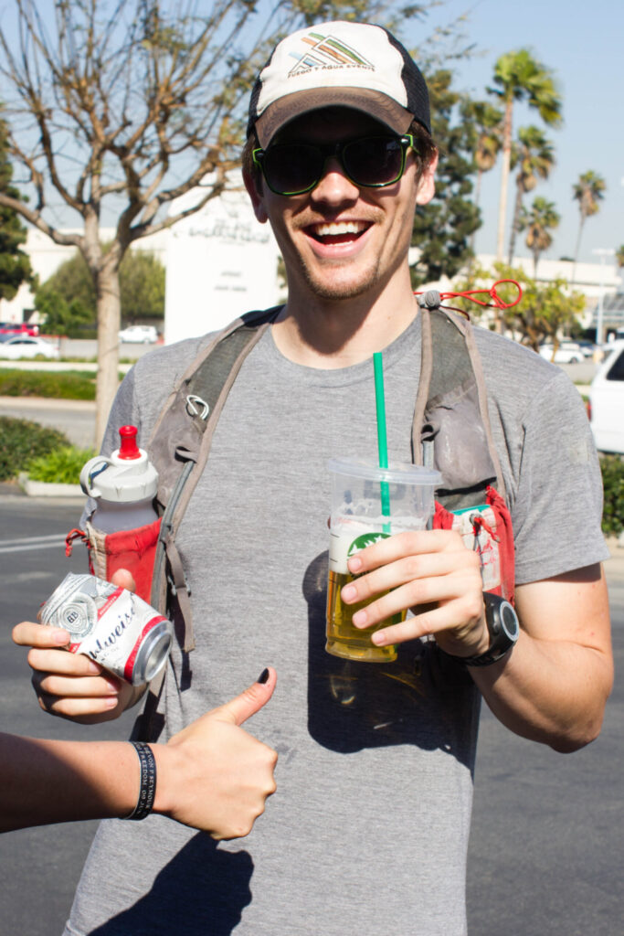 Picture of Justin Atteberry with some drinks ready to go for a run.